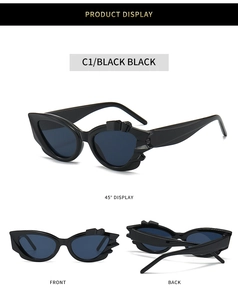 Detailed multi-angle views of black cat-eye sunglasses with unique wavy textured frames