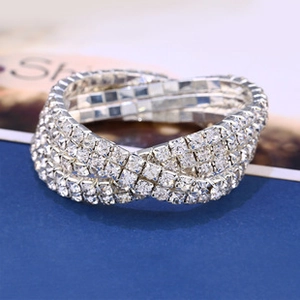 Detailed macro view of silver multi-layer rhinestone bracelet with sparkling crystals