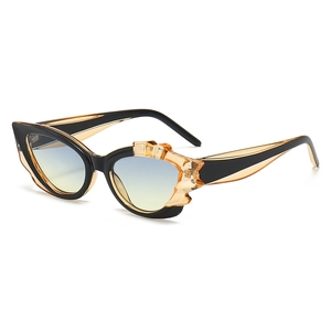 Cat-eye sunglasses with tortoiseshell frame and blue-yellow gradient lenses for women