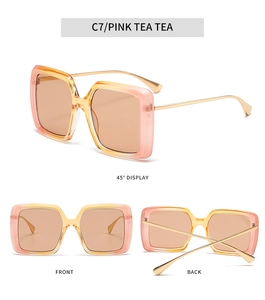 Vue détaillée des lunettes de soleil carrées dégradées rose thé et branches en or