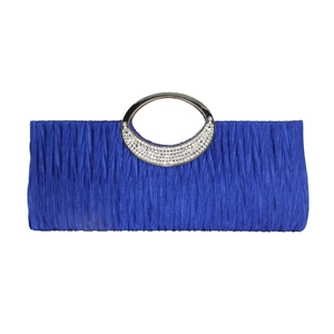 Close-up of royal blue pleated satin fabric and rhinestone handle on the evening clutch bag