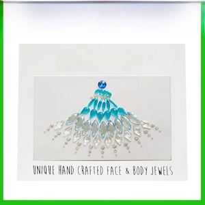 Unique handcrafted blue crystal face and body jewels in original brand packaging