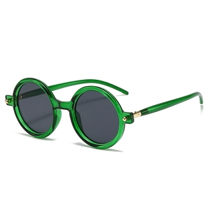 Retro round sunglasses with green translucent frames and dark grey lenses for fashion