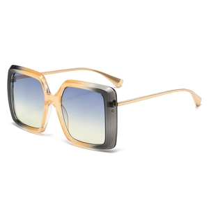 Lunettes de soleil carrées rétro avec verres dégradés et fines branches en métal doré