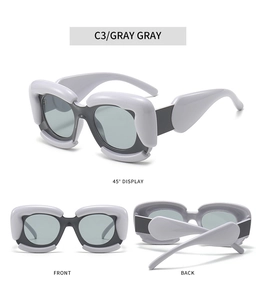 Three-angle display of gray oversized cloud frame sunglasses with chunky temple design