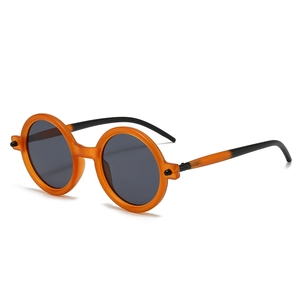 Vintage retro round orange matte sunglasses with dark lenses and stylish two-tone temples