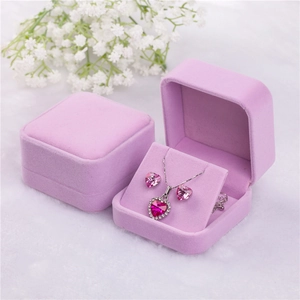 Elegant lavender velvet jewelry box set with open and closed displays for earrings