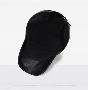 Detailed interior view showing black fabric lining and reinforced stitching of the leather cap