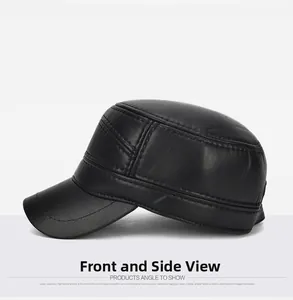 Detailed 45-degree side view of black leather flat top cap with fine stitching