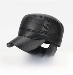 Detail view of black faux leather winter hat with quilted design and ear protection