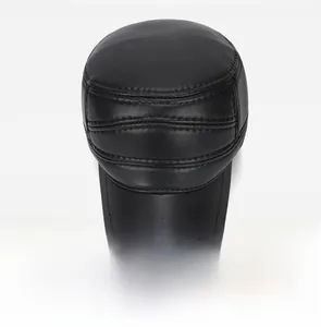 Top view detail of black faux leather military cap with lychee pattern texture