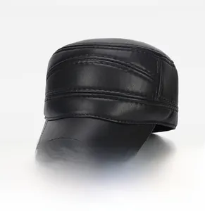 Detail view of black faux leather military cap showing textured grain and stitching
