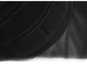 Detailed macro view of the inner sweatband and premium black leather texture of the winter cap