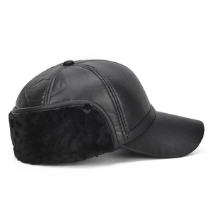 Men's stylish black leather baseball cap with warm faux fur earflaps for winter