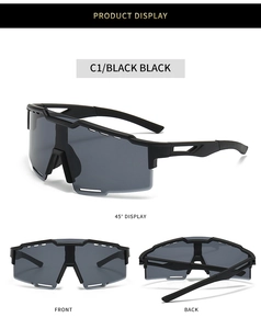 Detail of black sports cycling sunglasses featuring windproof large frame and vented temples