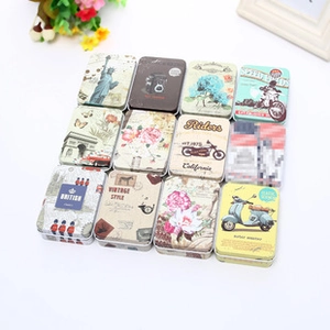 Set of 12 vintage rectangular tin boxes featuring retro motorcycle and floral patterns