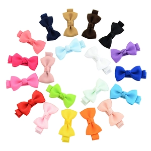 Set of 20 colors handmade cute ribbon bow hair clips for girls in a circular layout