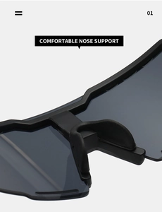 Detail shot of the adjustable soft rubber nose support on matte black sports sunglasses