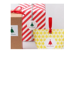 Detail of Merry Christmas adhesive stickers on gift boxes and festive packaging bags