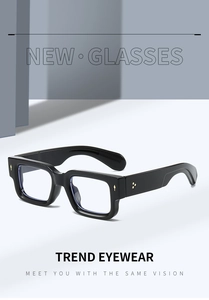 Macro view of thick rectangular black eyewear frame with star rivets on the temples