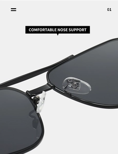 Close-up of comfortable silicone nose pads and metal bridge on black aviator sunglasses