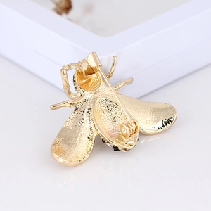 Golden bee brooch pin with realistic metal texture and secure back pin closure