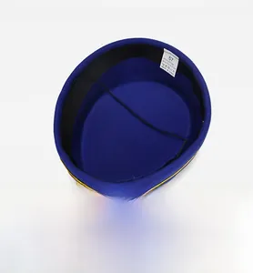Internal detail of blue uniform hat showing cotton-polyester lining and gold trim