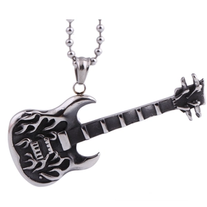Macro detail of retro silver guitar pendant featuring artistic flame patterns and bead chain