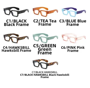 Flat lay of retro rectangle eyewear frames in seven assorted colors and tortoiseshell patterns