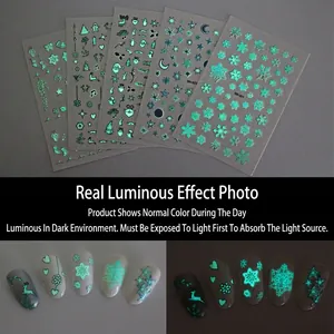 5 sheets of waterproof glow-in-the-dark Christmas nail stickers with snowflakes and reindeer