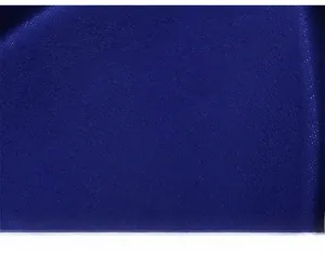Close-up of premium deep blue velvet fabric with soft plush texture and detailed fiber weave