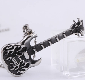 Detailed close-up of retro silver electric guitar pendant with flame pattern and ball chain
