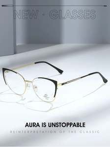 Detail of stylish black and gold cat-eye glasses frame with anti-blue light metal hinges