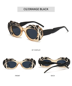 Vue sous trois angles de lunettes de soleil vintage orange translucide style steampunk