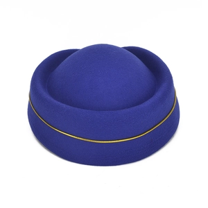 Royal blue wool felt flight attendant hat with gold trim on a clean white background