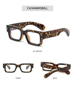 Three-way view of hawksbill tortoise shell square glasses with metal rivet details