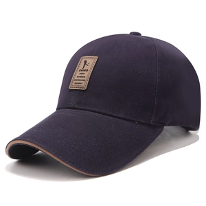 Berretto da baseball in cotone blu scuro con toppa in pelle marrone e bordo elegante