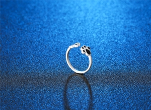 Cute S925 silver cat paw open ring featuring a black enamel kitty footprint design