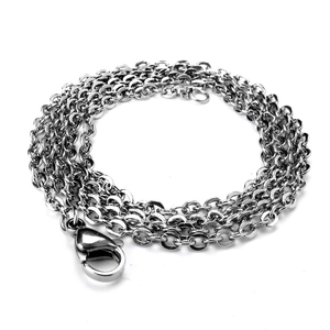 Detailed macro view of the shiny stainless steel chain and secure lobster clasp mechanism