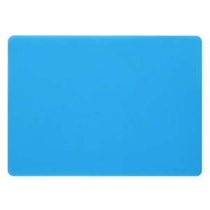 Detail view of a bright blue rectangular silicone placemat with rounded edges on white background