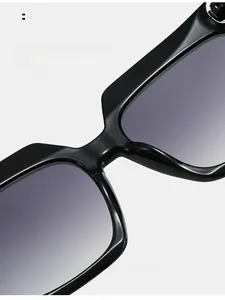 Detail shot of the comfortable nose pads on these black square oversized sunglasses