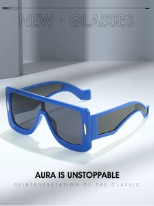 Detail view of futuristic blue square sunglasses with metallic gold accents on the frame