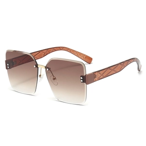 Fashionable square rimless sunglasses with gradient brown lenses and wide embossed temples
