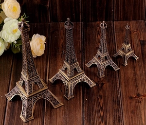 Detailed set of four bronze Eiffel Tower alloy models in varying sizes for home decor