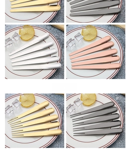 Detail of four-color stainless steel sporks in silver, gold, rose gold, and black