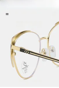 Detail of metal cat-eye frames showing Anti-Blue Light and UV400 protective lens coating