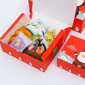 Christmas red gift box with Santa motif, showing open and closed views with holiday snacks