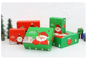 Detailed view of red and green Christmas gift boxes with Santa and reindeer illustrations