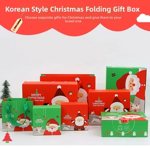 Assorted Christmas gift boxes and paper bags featuring festive Santa and reindeer designs