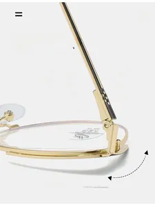 Detail of durable texture spring hinge on gold metal frames with blue light blocking lenses